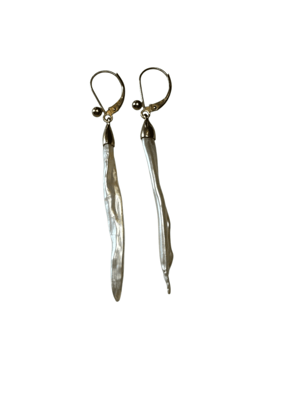 Long pearl drop earrings, gold hooks.