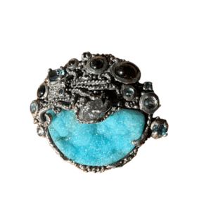 Turquoise gemstone ring with mixed stones.